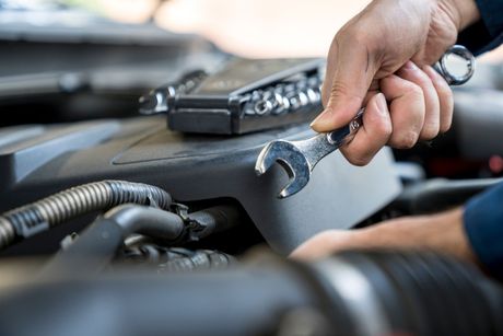 Holding a Wrench — Saint Marys, PA — Reider's Auto Repair Holding a Wrench — Saint Marys, PA — Reider's Auto Repair
