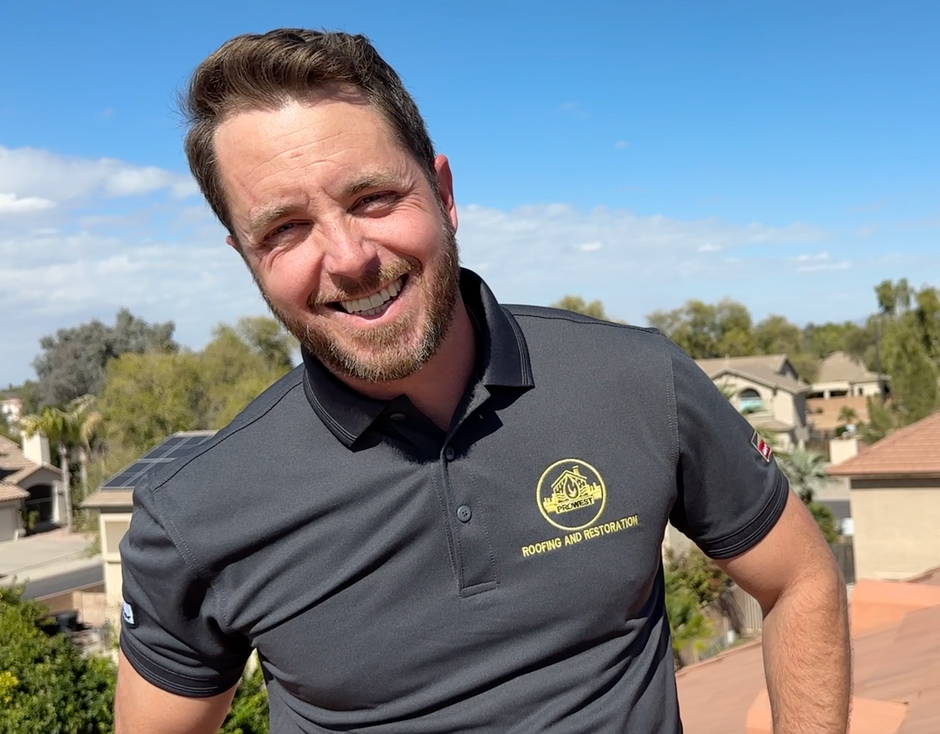 Kyle the roofing pro with a beard wearing a polo shirt that says ' new balance ' on it