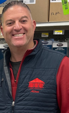 A man wearing a vest that says a brave on it