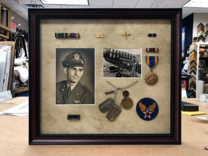 A framed picture of a man in a military uniform