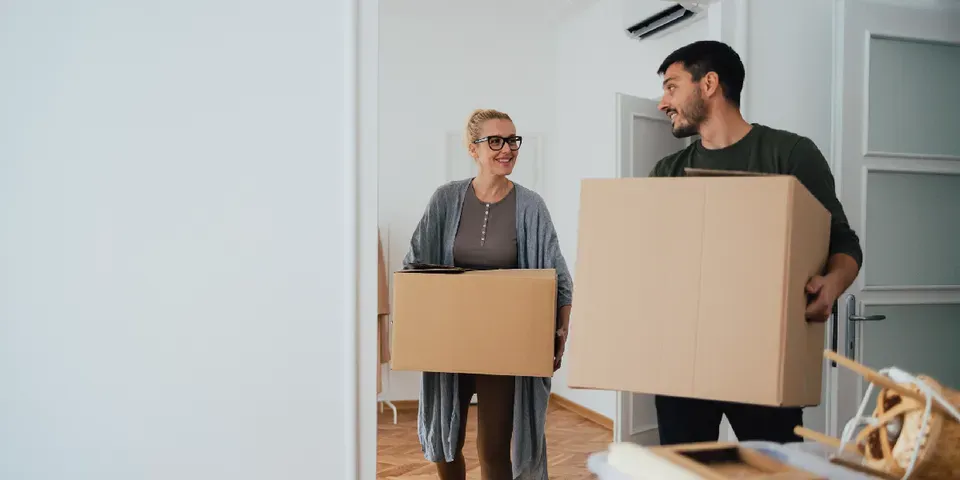 People Holding a Box — Elizabethtown, KY — RobinBrooke Storage