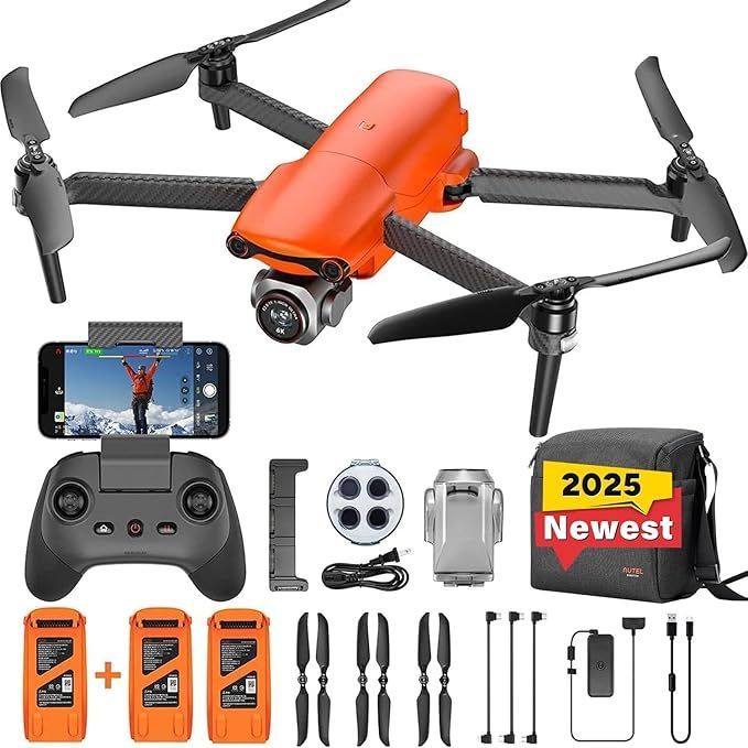 Orange quadcopter drone kit with remote, phone mount, extra batteries, propellers, and tools