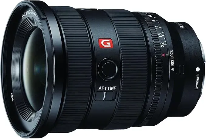 A close up of a camera lens on a white background.