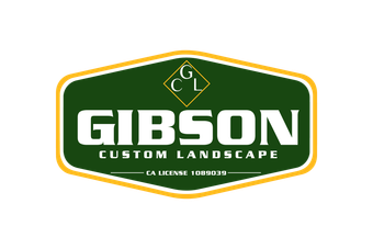 A green and yellow logo for gibson custom landscape.