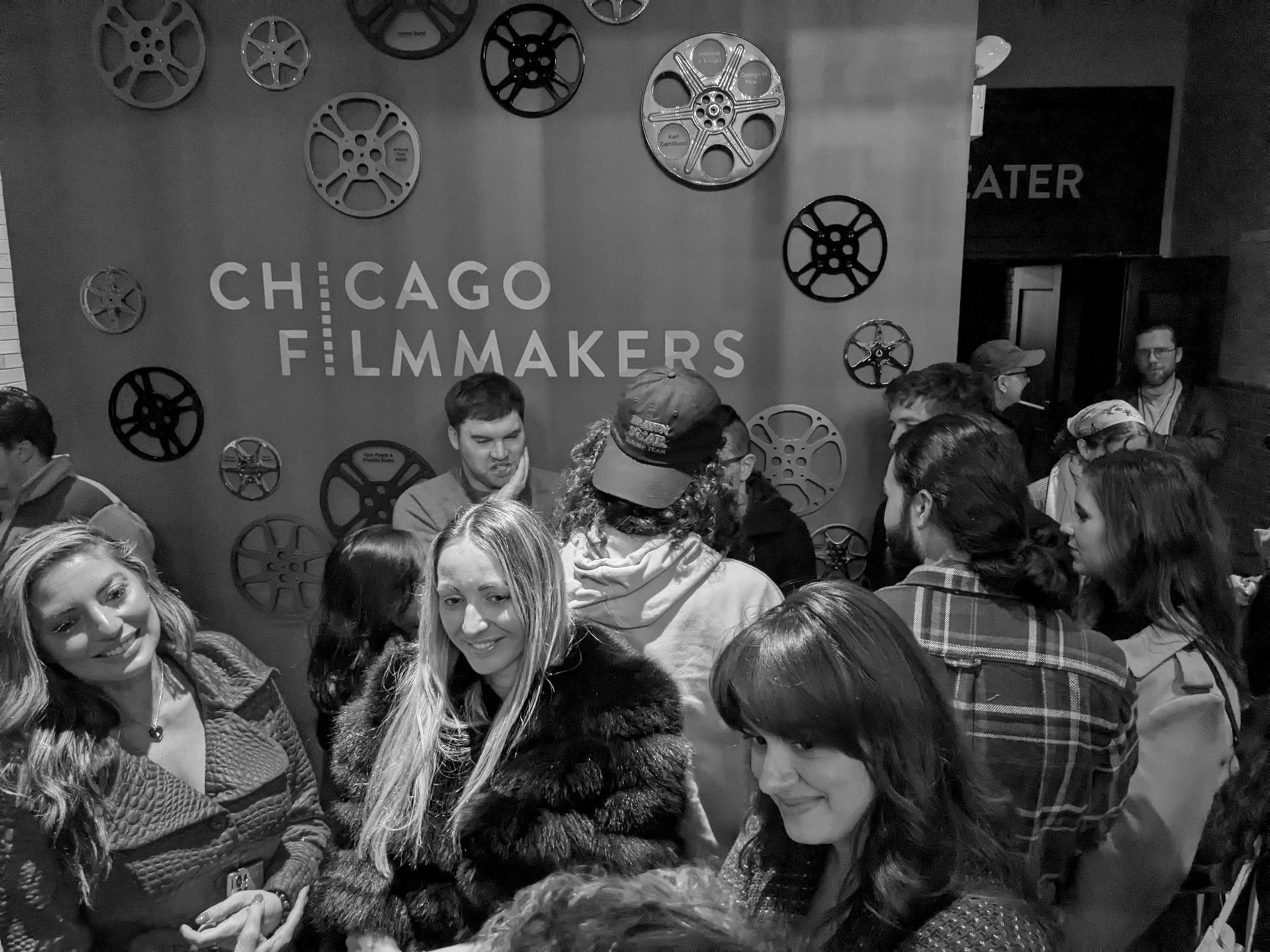 Black and white photo: Group of people at 