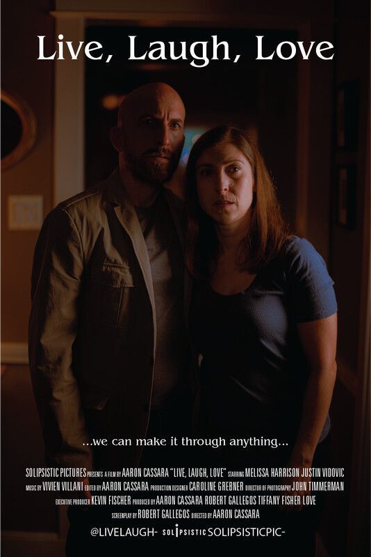 A couple stands in a doorway, the man with a beard, the woman looking concerned. Text: