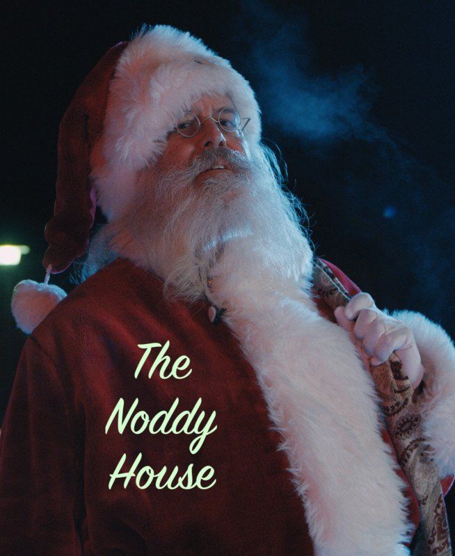 Santa Claus wearing a red suit with