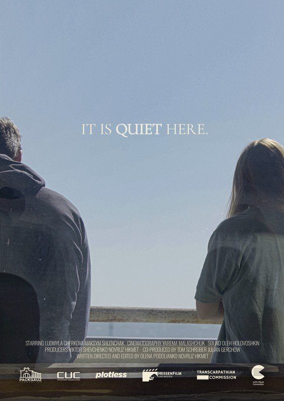 Man and woman looking out over water; text reads