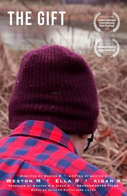 Person in red plaid shirt and maroon beanie, outdoors near a body of water; film poster for