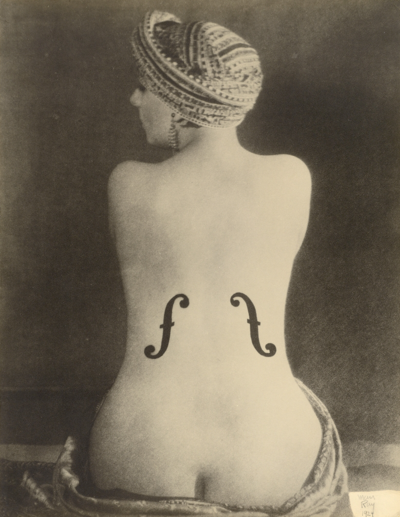 Quastel Associates Valuers | Woman's bare back, seated, turban, two f-holes drawn on her back, black and white photograph.