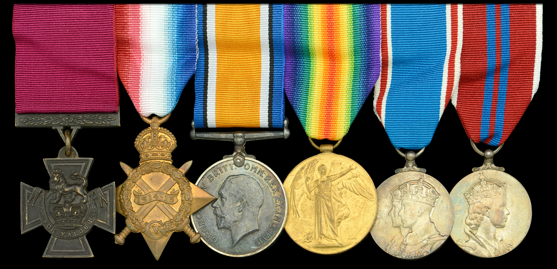Quastel Associates Valuers | A collection of six British military medals, including the Victoria Cross.
