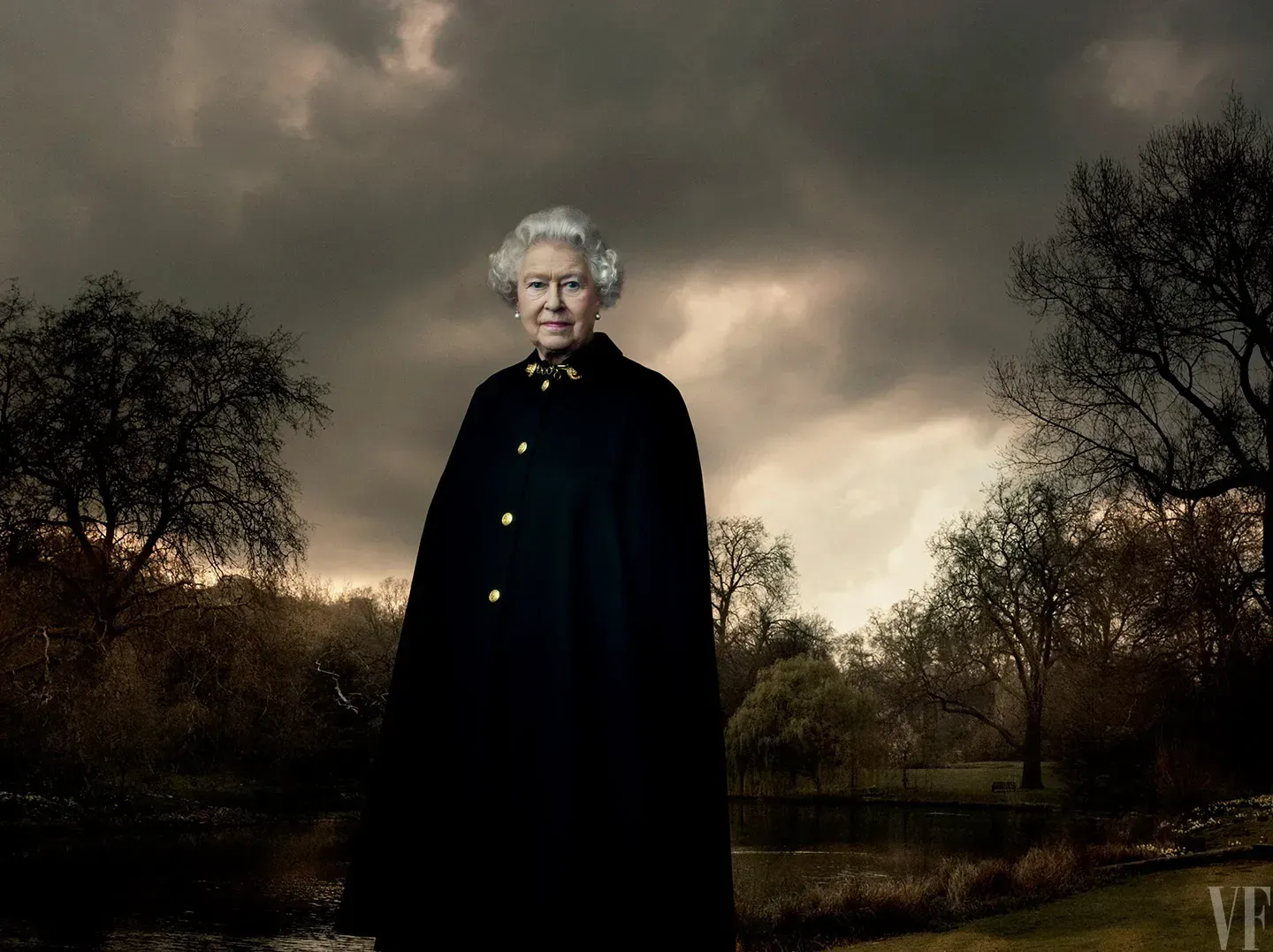 Quastel Associates Valuers | Queen Elizabeth II in black cloak, standing outdoors against a dark, cloudy sky.