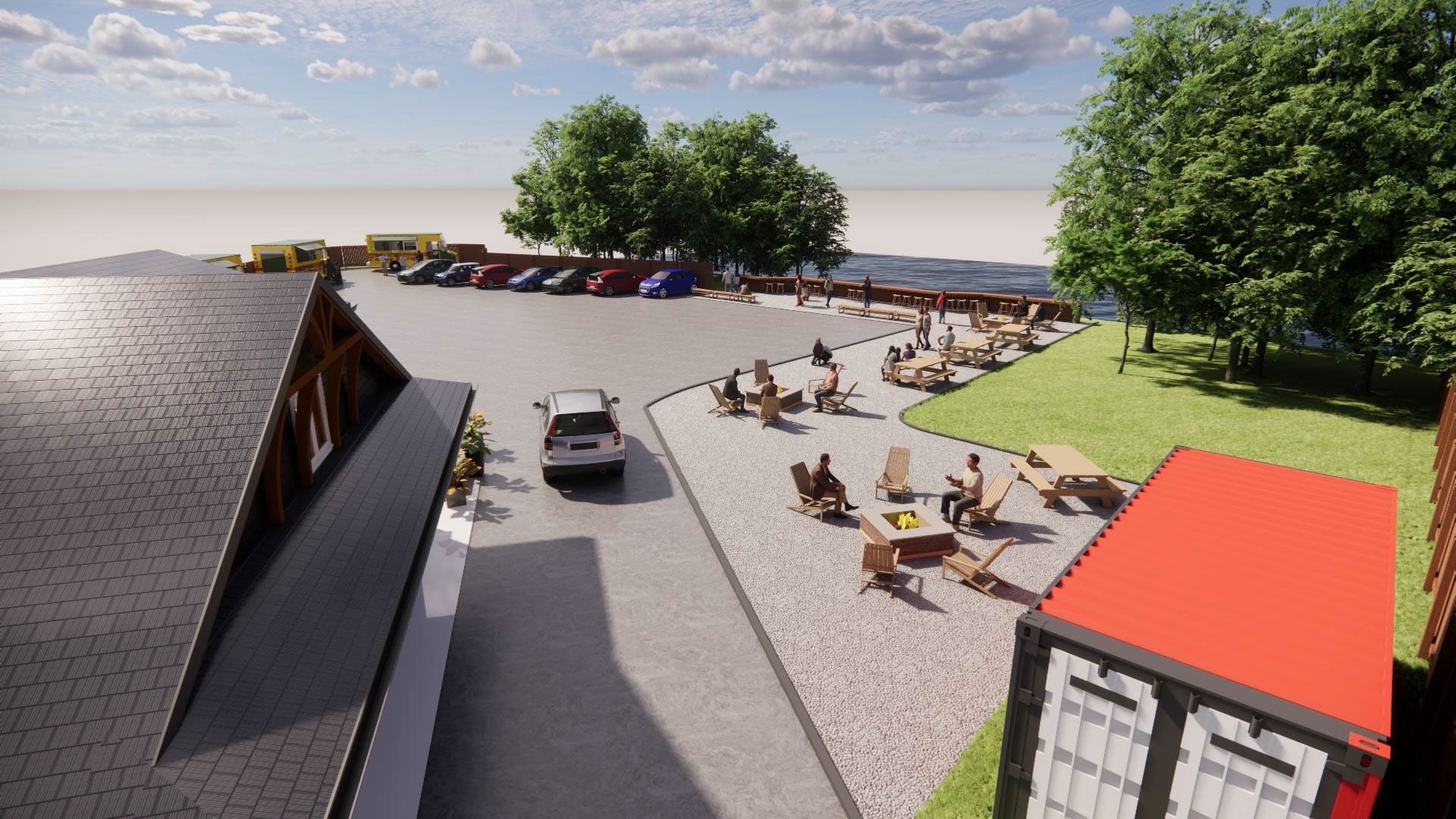 An aerial view of a parking lot with tables and chairs.