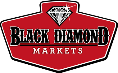 A red and black logo for black diamond markets with a diamond on it.