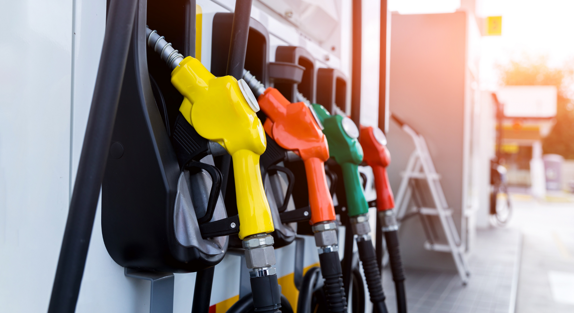 A row of gas pumps at a gas station.