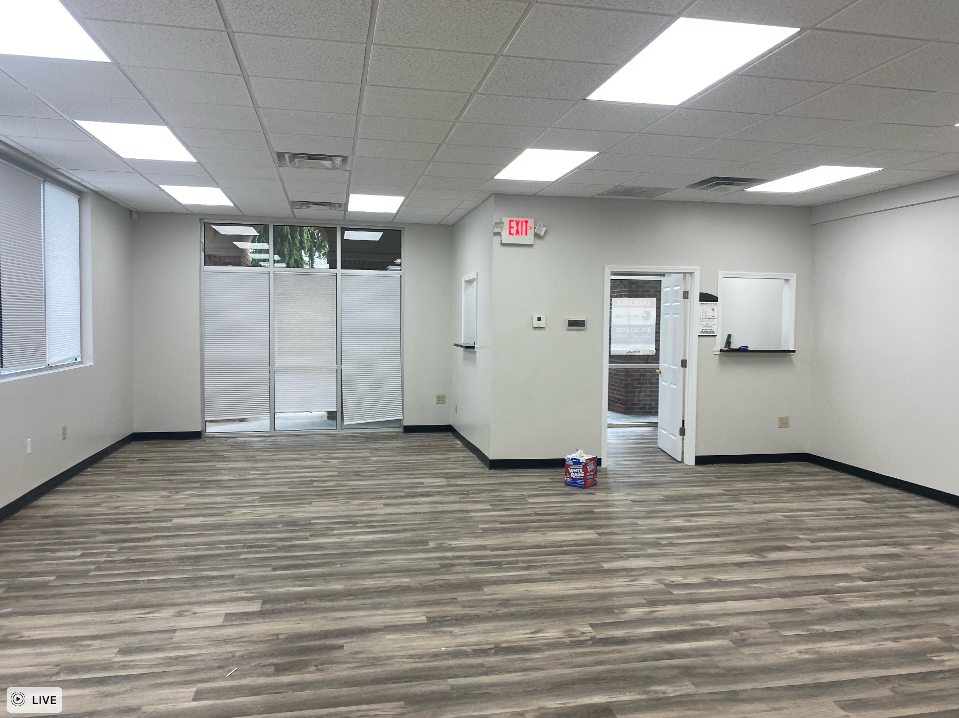 An office with new flooring remodeled by Hampton Construction & Development.