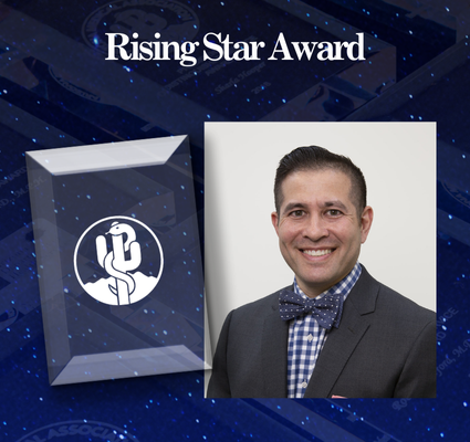 Rising Star Award graphic with a smiling man in a suit beside a crystal award plaque on a starry blue background