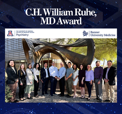 Banner University Medicine Psychiatry team posing under a sculpture with “C.H. William Ruhe MD Award” text.
