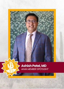 Portrait of Ashish Patel, MD in a suit against a tiled wall, framed by an orange AHA Member Spotlight banner