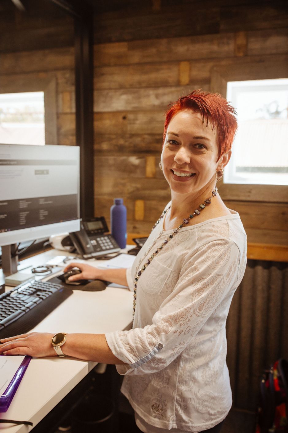 Happy Yoliza At Her Desk — Catalyst Accounting & Tax in Warwick, QLD