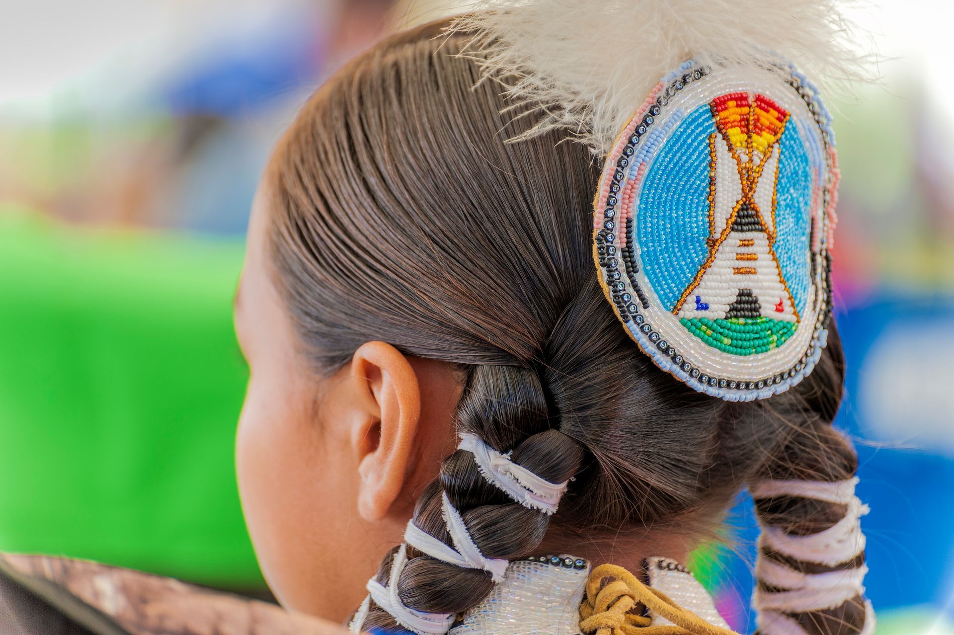 Girl with an elaborately beaded head dress