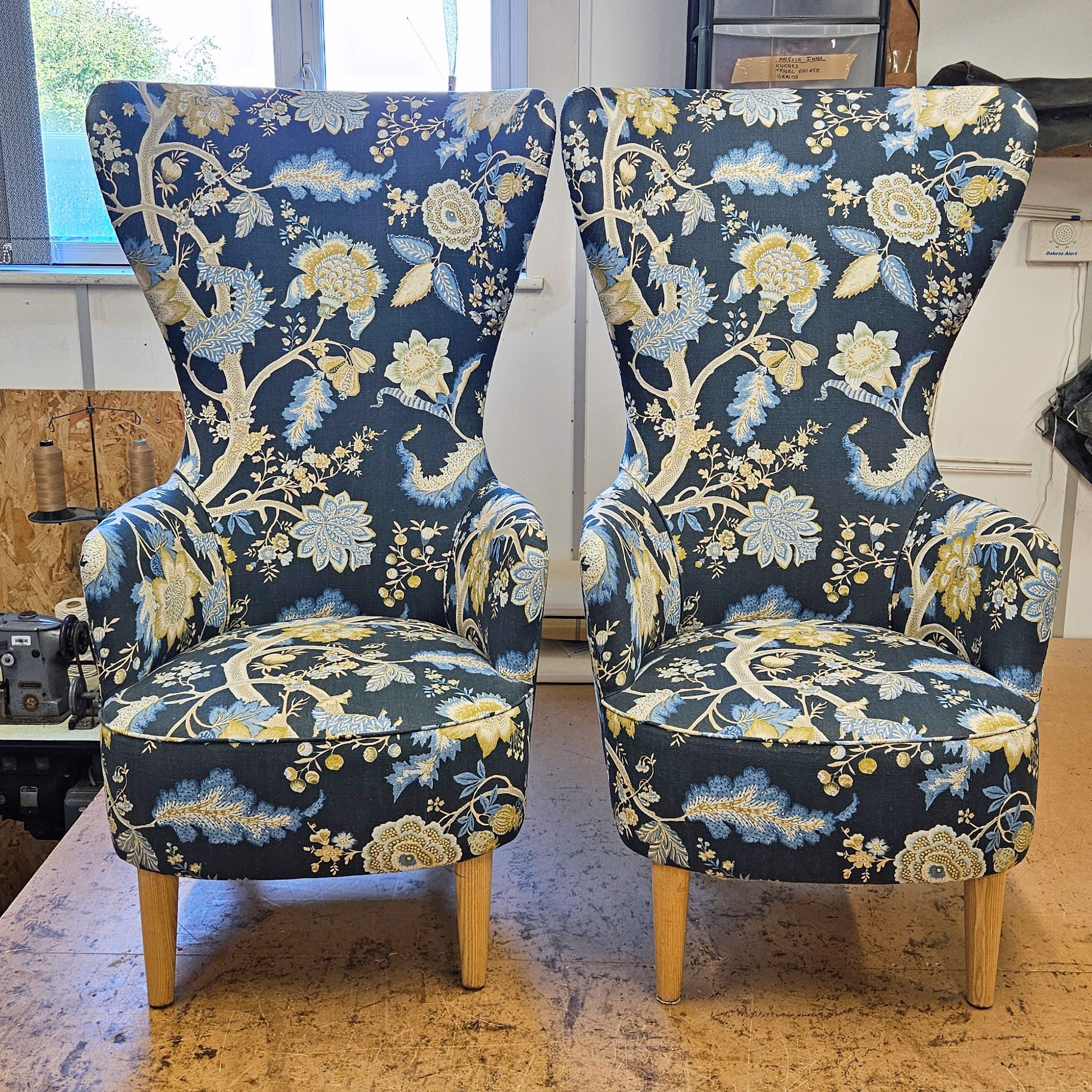 High back wing armchairs with new fabric after