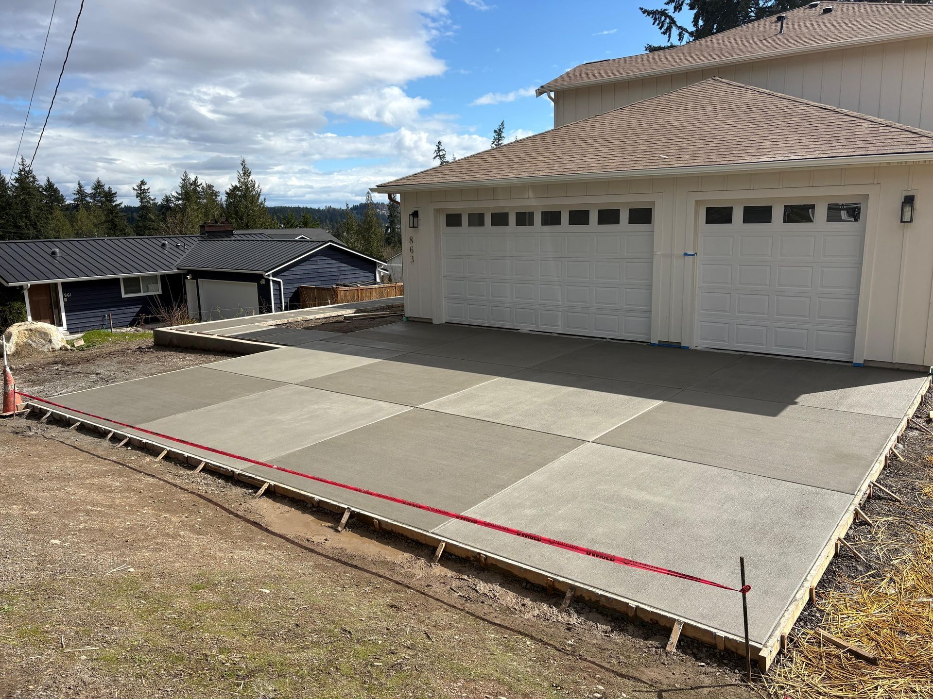 A house with a concrete walkway