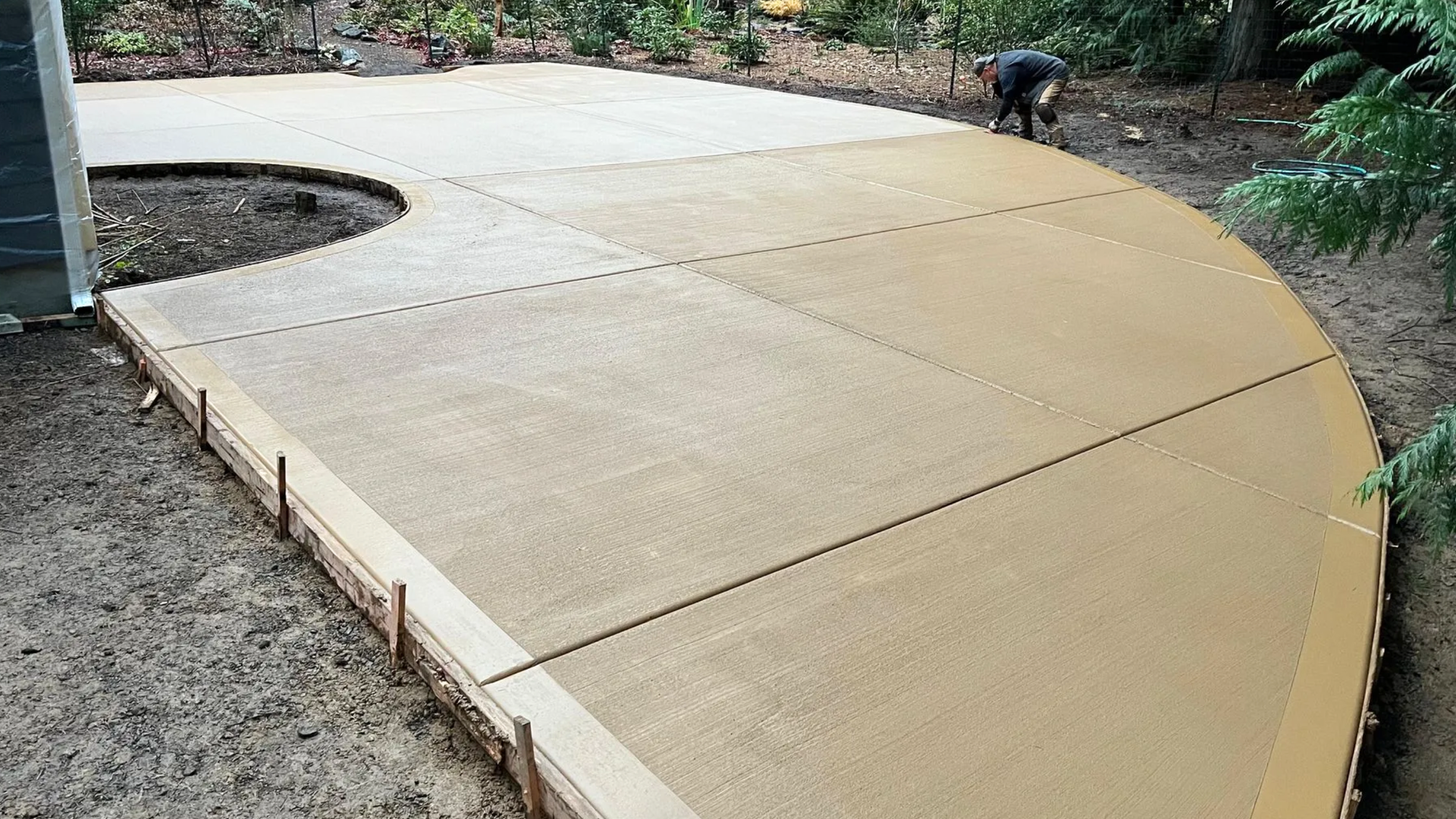 Fresh concrete pour protected by a cover during winter at a Silverdale WA home