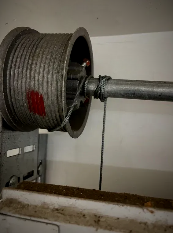 Garage door torsion spring and cable drum repair in Aurora CO