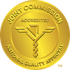 Gold Joint Commission “Accredited” National Quality Approval seal with medical caduceus symbol