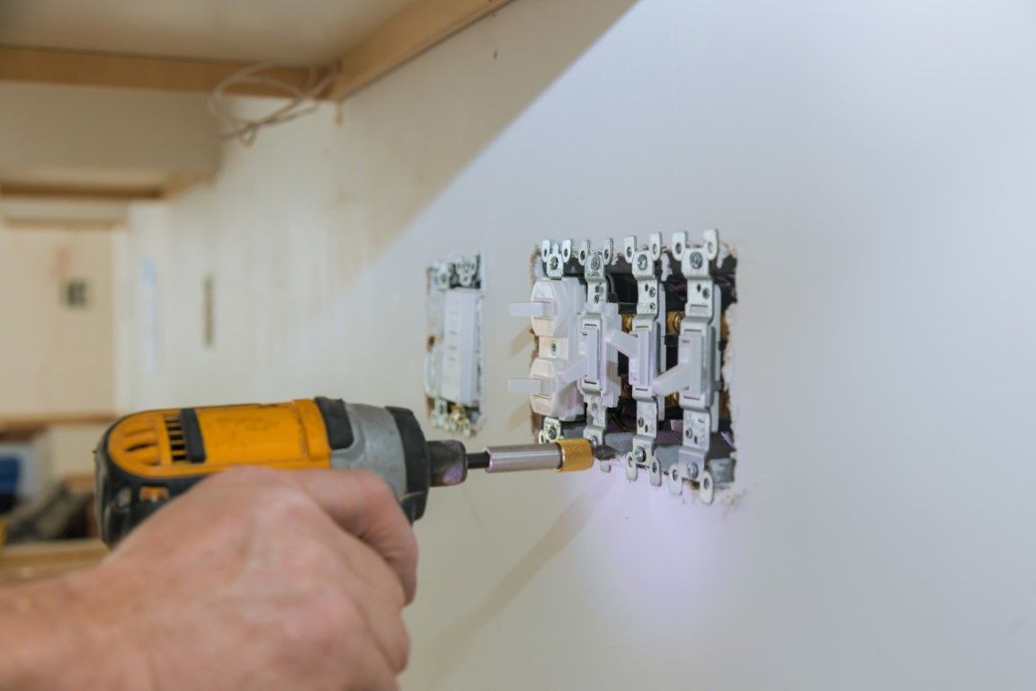An image the installation of electrical switches.