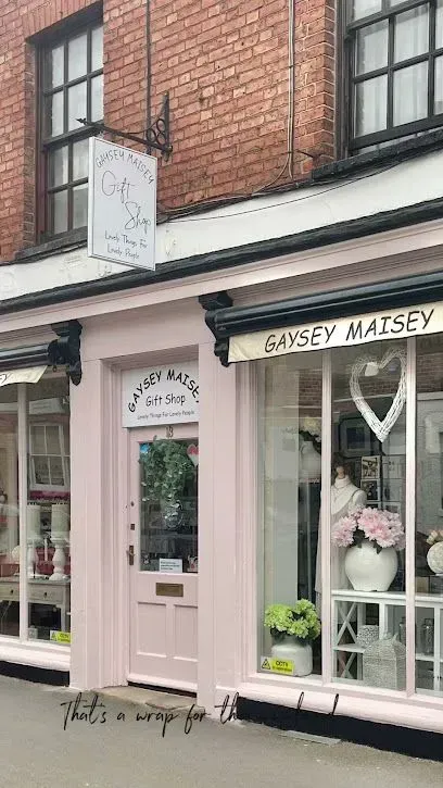 Pink shopfront with sign