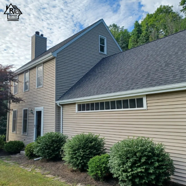 A house with a roof that is covered in shingles