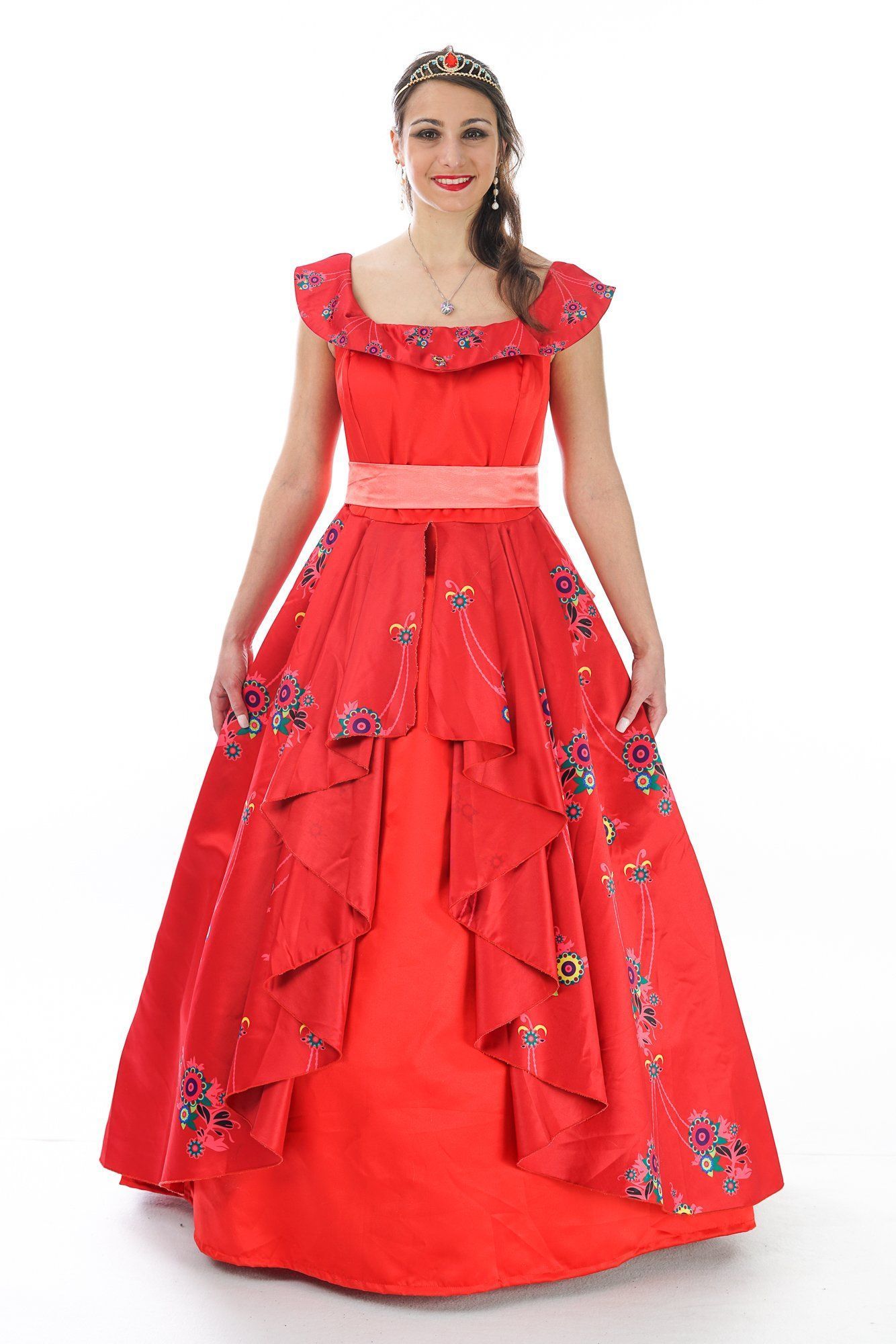 Woman modeling a bright red off-shoulder evening gown with floral accents on a white background