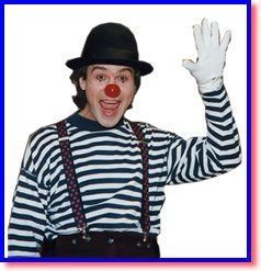 Clown in striped shirt and black hat, smiling and waving with a red nose and white gloves