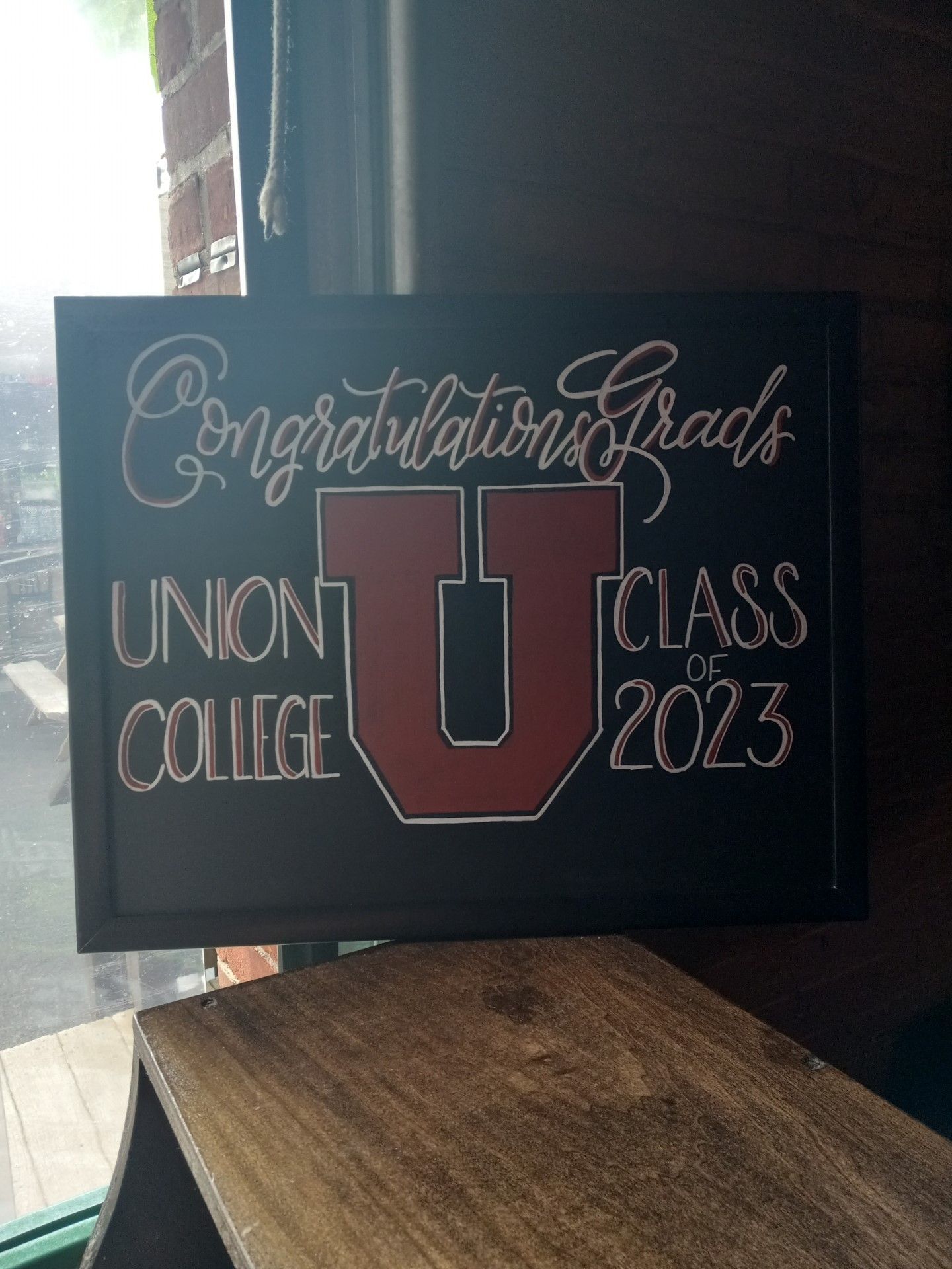 Congratulations sign for Union College class of 2023 with a large red “U” on a black background.