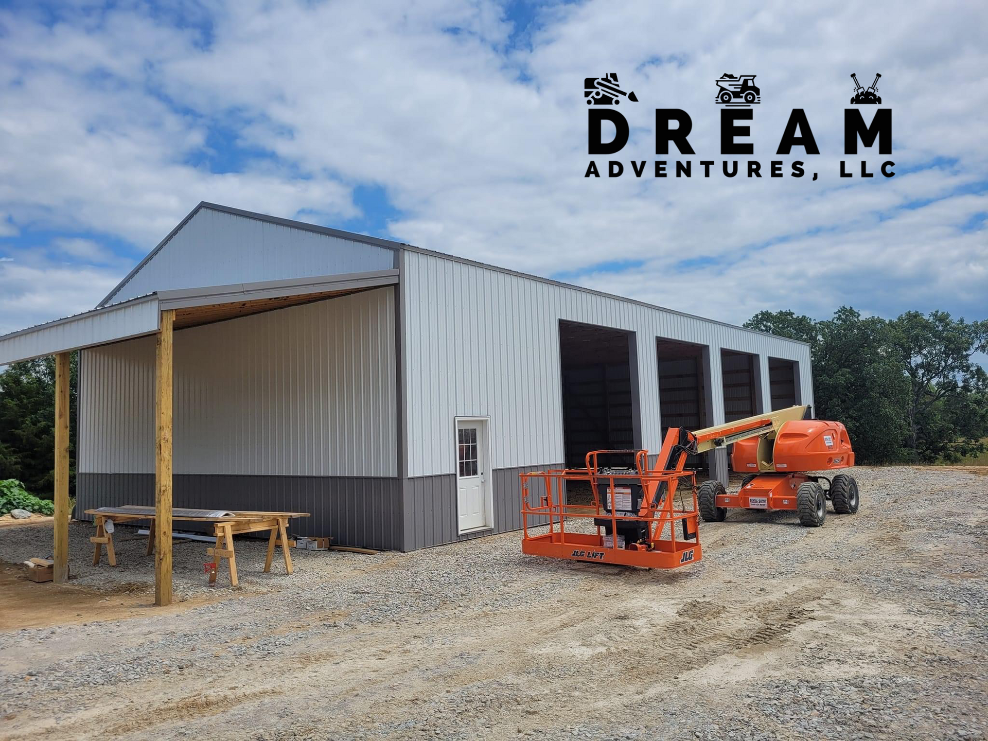 a dream adventures llc logo is on the side of a building