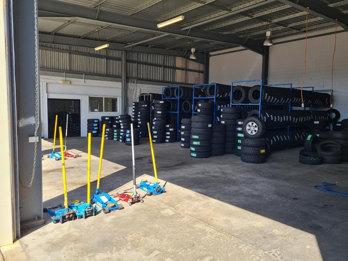 A Warehouse Filled with Lots of Tires — Petersen's Second Hand & New Tyres in Currajong, QLD