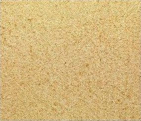 Superficie testurizzata con macchie color marrone chiaro e beige.