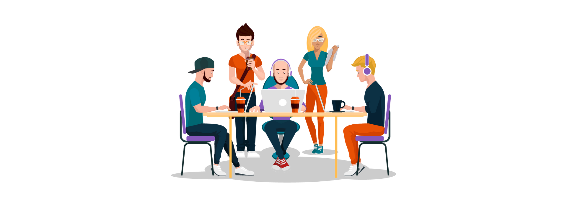 A group of people are sitting around a table with laptops.