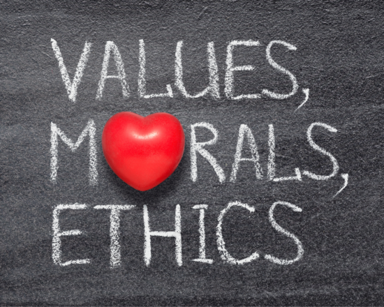 Chalkboard with the words “VALUES, MORALS, ETHICS” and a red heart replacing the O in MORALS.