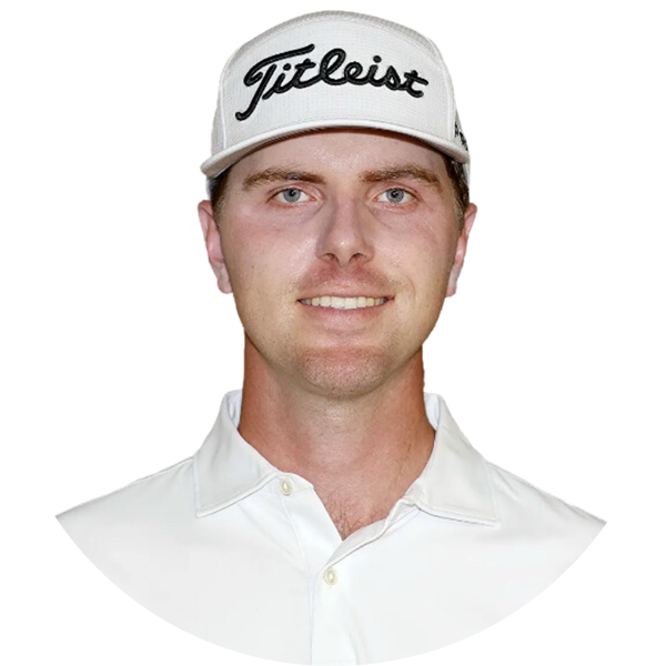 Golfer wearing a Titleist cap smiles at the camera. White shirt, light skin, neutral background.