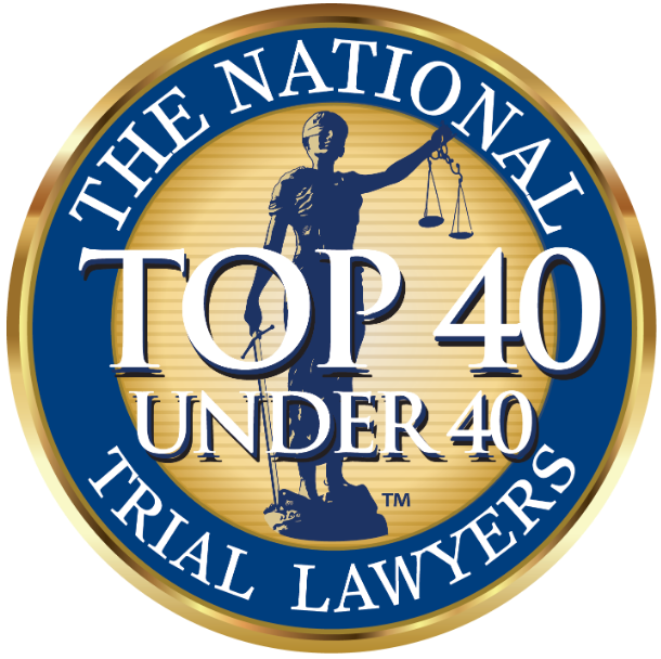 Circular logo with a gold center and blue border featuring Lady Justice and the text