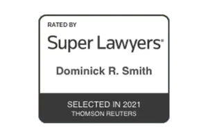 Super Lawyers badge for Dominick R. Smith, selected in 2021 by Thomson Reuters.