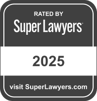 A dark gray square badge with rounded corners featuring the white text