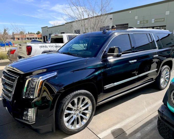 Black Cadillac Escalade ESV after ceramic coating service at Wet Paint Auto Detailing
