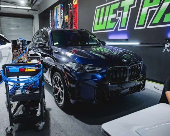Blue BMW X-series SUV after ceramic coating at Wet Paint Auto Detailing in Roseville, CA