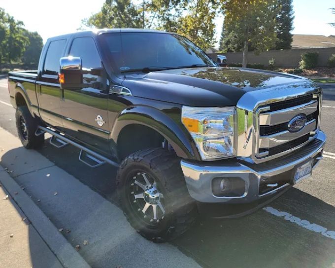 Lifted black Ford F-250 Super Duty with PPF paint protection film in Roseville, CA