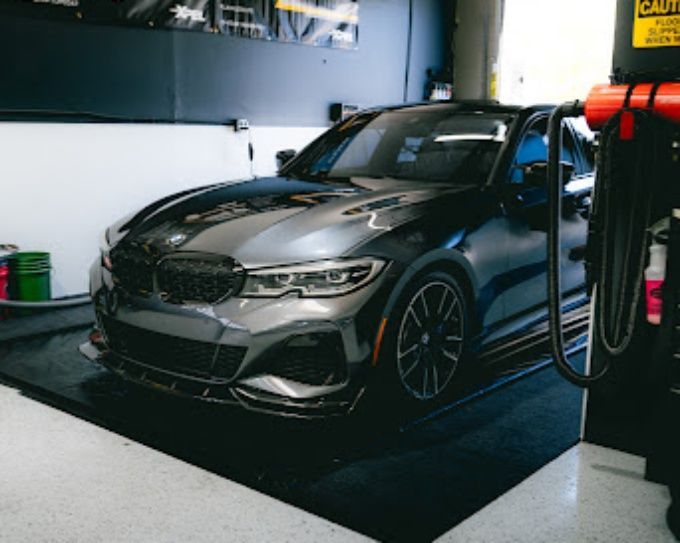Gray BMW sedan after ceramic coating and paint protection at Wet Paint Auto Detailing, Roseville, CA
