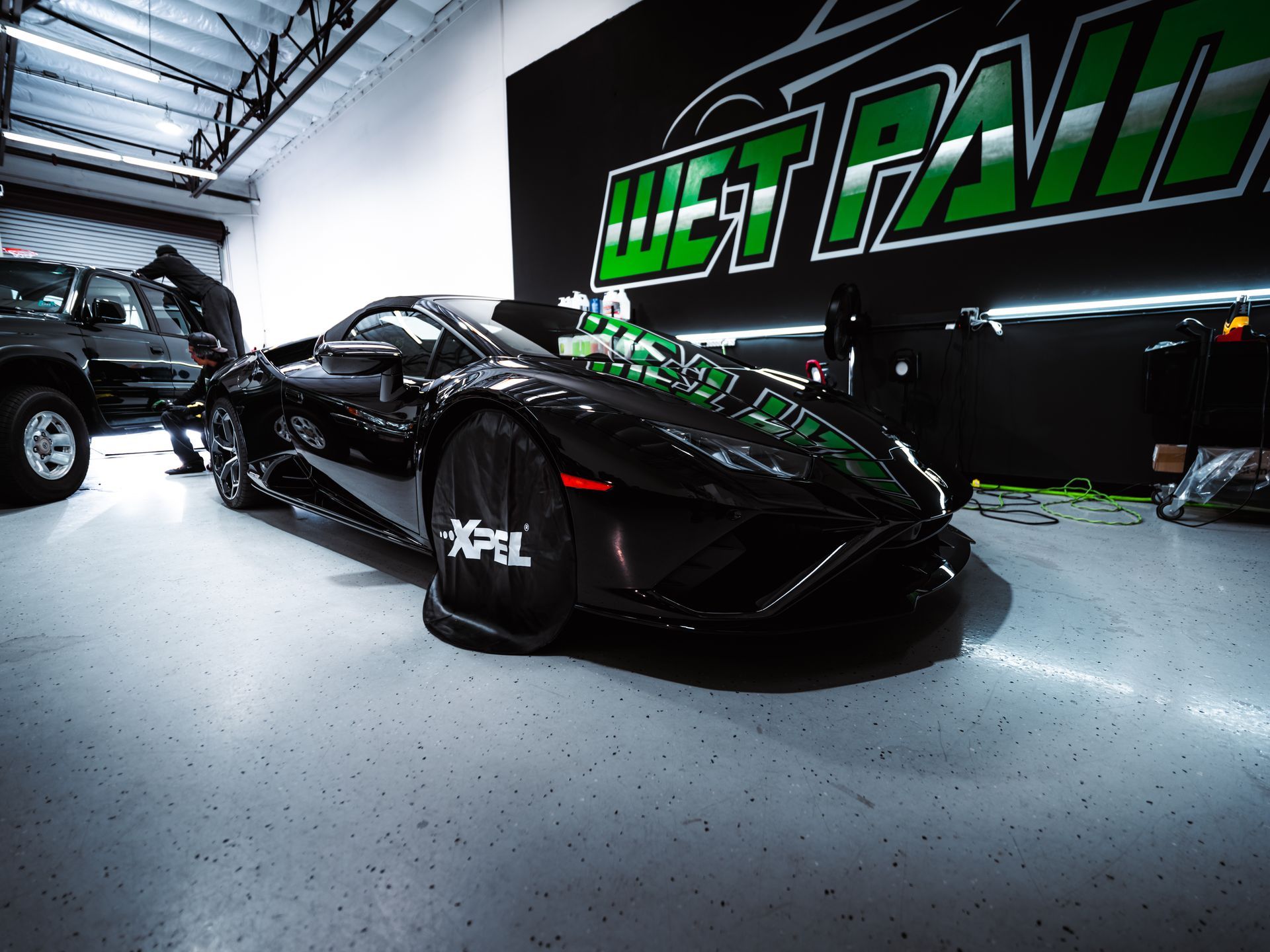 Black sports car inside 